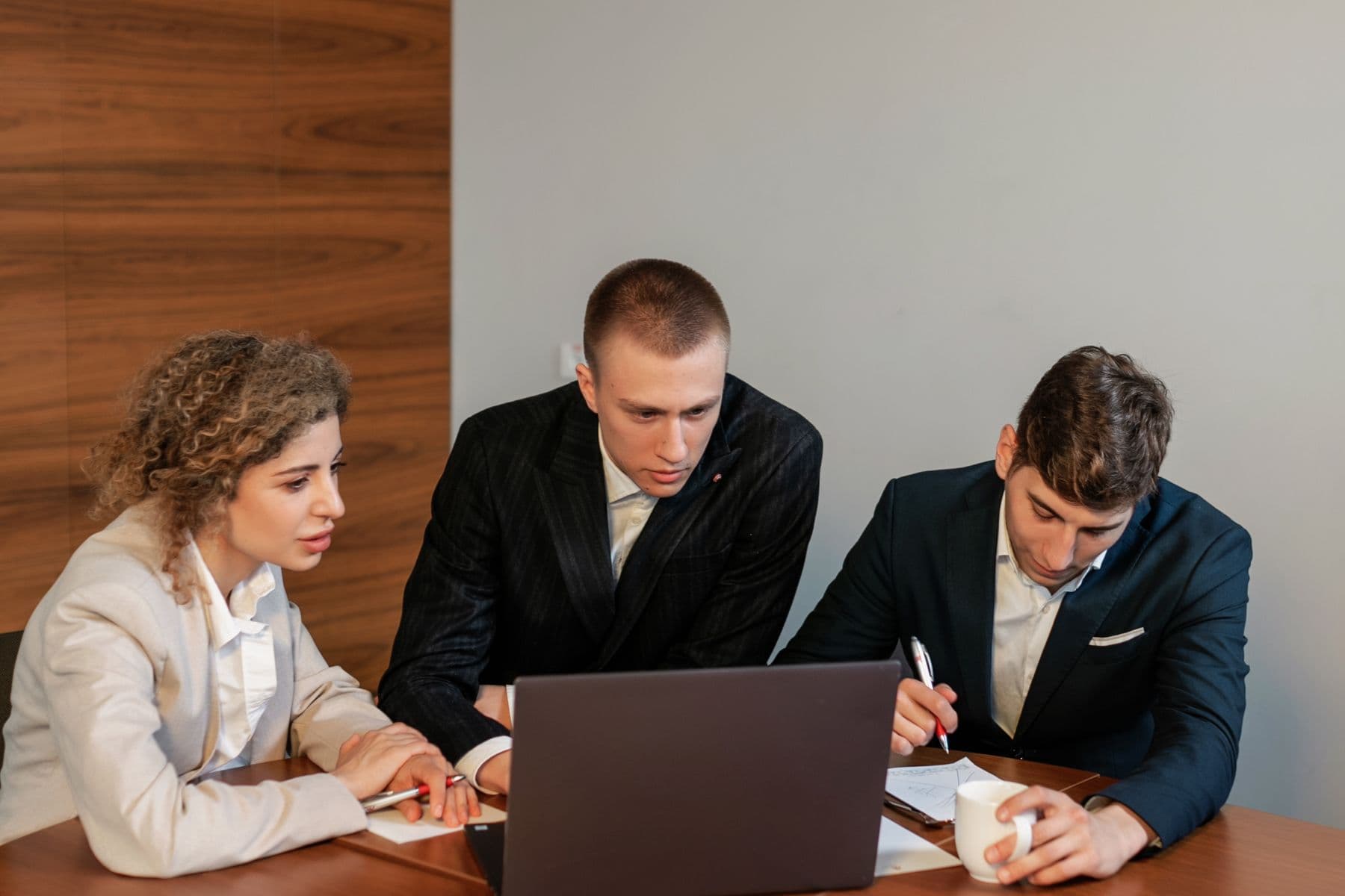 A team using product data to make a decision together